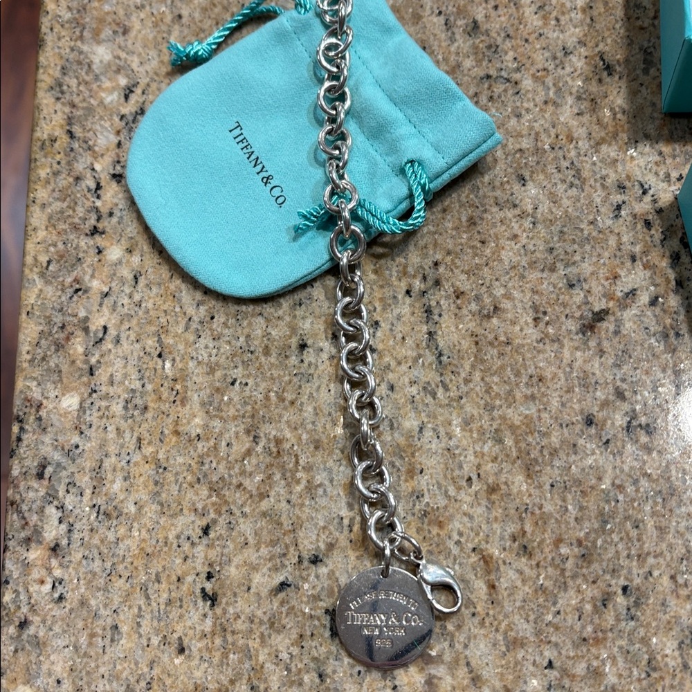 Tiffany & Co. Silver Chain Bracelet with Charm
“Please Return To Tiffany & Co.” - Picture 3 of 4